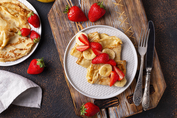 Crepes with strawberry and banana - Фото, зображення