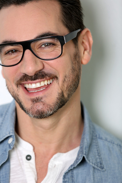 Portrait of smart guy with eyeglasses on - Фото, изображение
