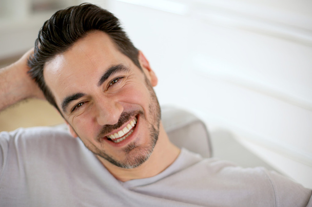 Portrait of smiling middle-aged man - Foto, afbeelding