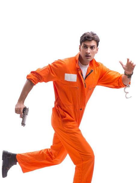 Prisoner with gun isolated on white background - Photo, Image