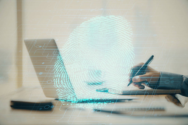 Hologramm des Fingerabdrucks mit einem Geschäftsmann, der am Computer im Hintergrund arbeitet. Sicherheitskonzept. Doppelbelastung. - Foto, Bild