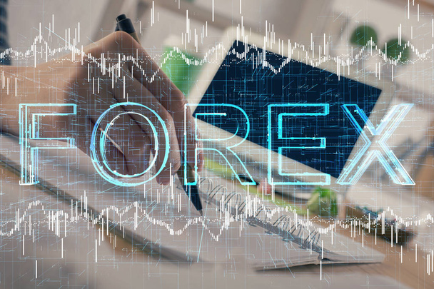 Financial forex graph drawn over hands taking notes background. Concept of research. Double exposure - Photo, image