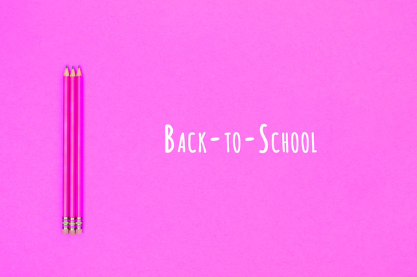 Pencils on a neon pink background. Back to school concept - Foto, immagini