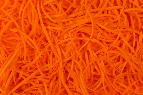 Carrot grated background close-up  - Zdjęcie, obraz