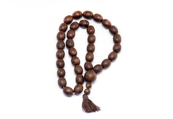 Religion wooden Beads isolated on white Background - Foto, Imagen