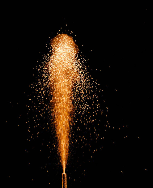 colorful fountain fireworks stream into dark night - Photo, Image