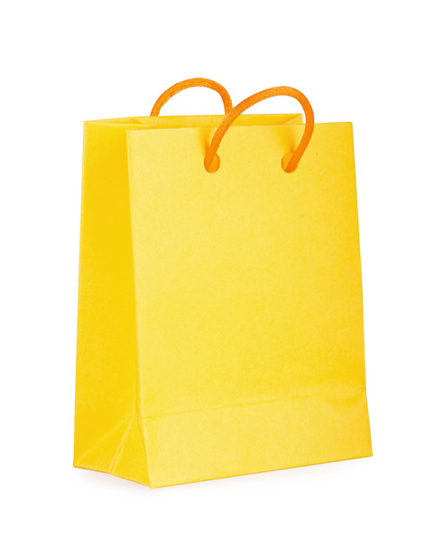 Yellow bag with purchases on the white - Foto, afbeelding