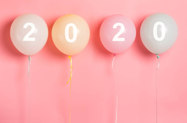 2020 concept on party balloons on pink background - Photo, image