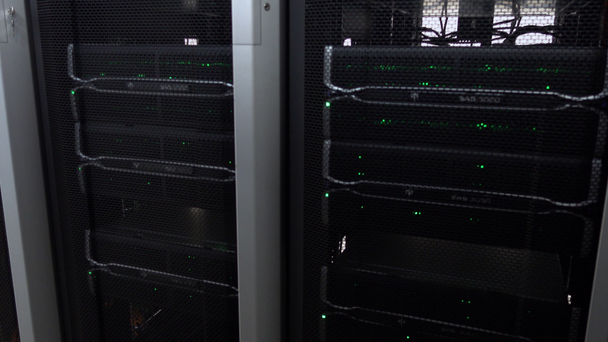 Large modern computing center. Supercomputer. Server racks with flashing lights. - Footage, Video