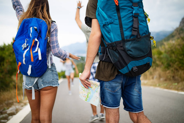 Group of backpackers and young people traveling and having fun together - Foto, Bild