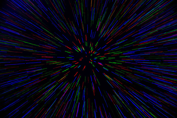 zoom natural explosión radial borrosa rojo verde puntos azules sobre fondo negro
 - Foto, imagen