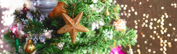 Banner Christmas tree festive background. Xmas decor toy balls snowflake cone sequins star snowflake. - Photo, Image