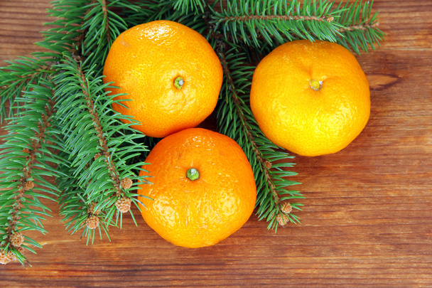 Tasty mandarines on wooden background - Zdjęcie, obraz