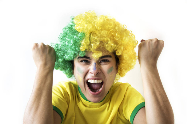 female brazil football fan posing on white background - Photo, image
