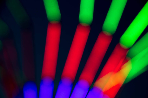 Абстрактний багатоколір флуоресцентного на чорному тлі
 - Фото, зображення