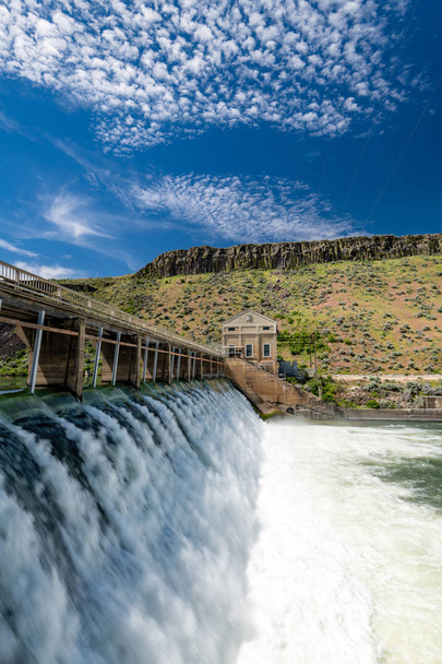 High water flow over diversion Dam on Boise River - Photo, Image
