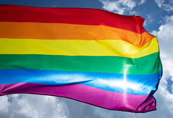 Colorful LGBT flag blows in the breez. - Fotoğraf, Görsel