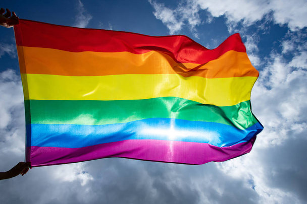 Colorful LGBT flag blows in the breez. - Foto, Imagem