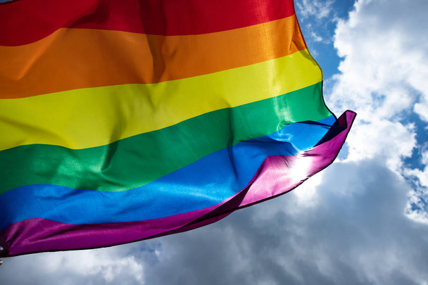 Colorful LGBT flag blows in the breez. - Foto, Imagen