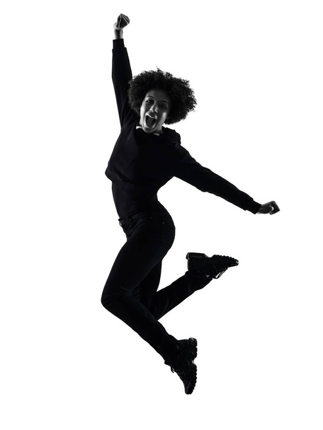 молодая девушка-подросток, прыгающая силуэт счастливой тени изолирован
 - Фото, изображение
