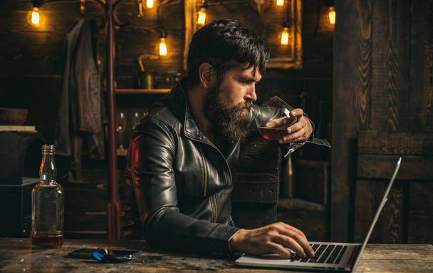 Portrait of a handsome man with beard. Brutality and masculine concept. Man with beard, biker in leather jacket. Portrait of stylish man beard. Vintage barbershop, shaving. Mens beauty, fashion. Male - Foto, afbeelding
