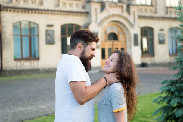Victim of domestic abuse by violent and brutal husband. Brutal man getting his hands around womans throat. Bearded hipster using brutal physical force against girl. Brutal attack against woman by man - Photo, image