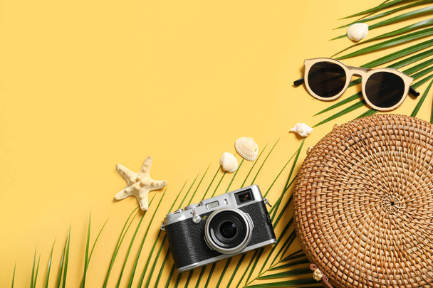 Flat lay composition with beach accessories on color background. Space for text - Foto, afbeelding