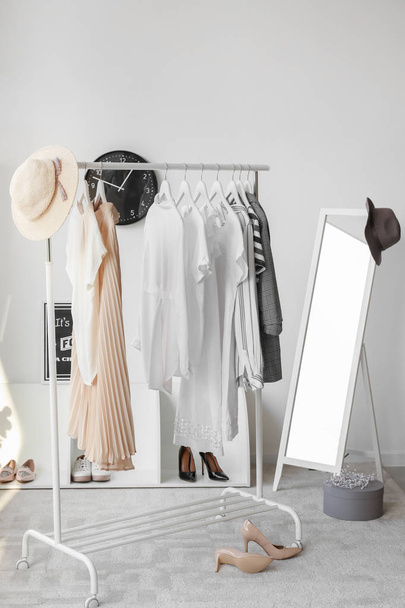 Interior of modern room with clothes rack - Photo, Image