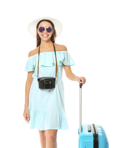 Жінка-туристка з багажем на білому тлі
 - Фото, зображення