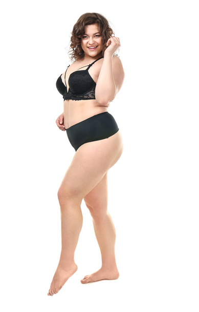 Happy plus size woman on white background. Concept of body positive - Photo, Image