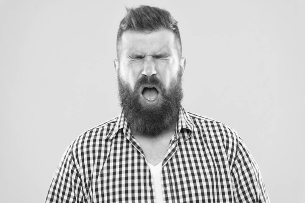 Man bearded hipster with sneezing face closed eyes close up yellow background. Brutal hipster sneezing. Allergy concept. Take allergy medications. Can not stop sneezing. I am going to sneeze - Foto, Bild