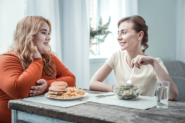 Charming slim female giving recommendations about healthy food - Valokuva, kuva