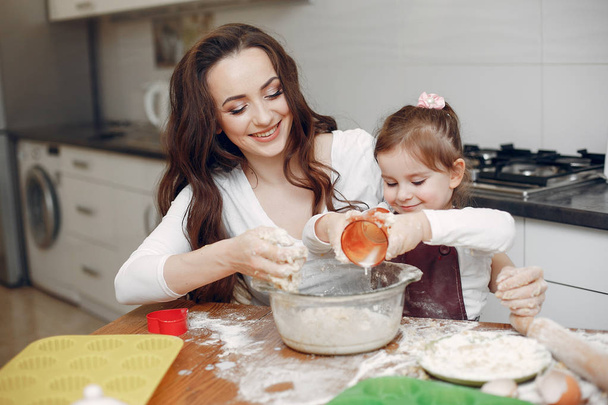 Family cook the dough for cookies - Фото, изображение