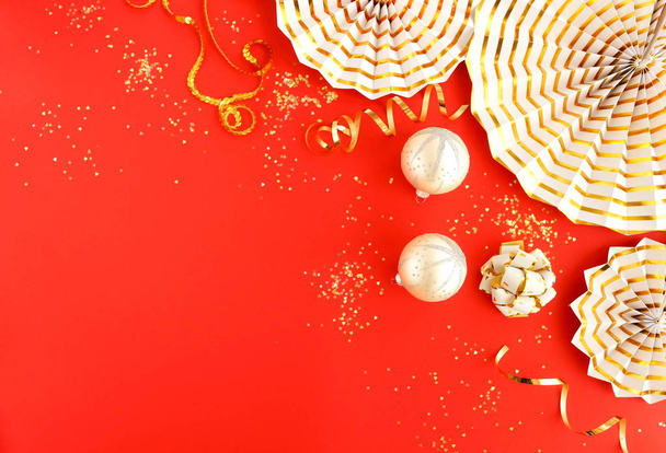Christmas background. Xmas or new year decorations on red background with empty copy space for text.  holiday concept for postcard or invitation. top view . flat lay - Foto, Imagem