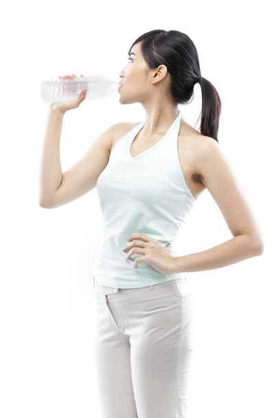 Pretty girl drinking water from bottle - Foto, Imagem