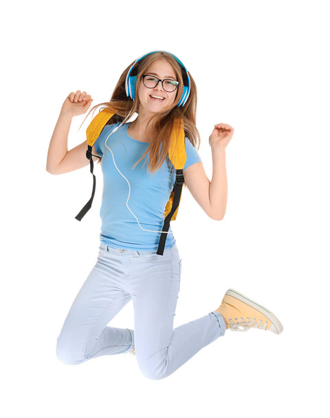 Jumping teenage girl on white background - Φωτογραφία, εικόνα