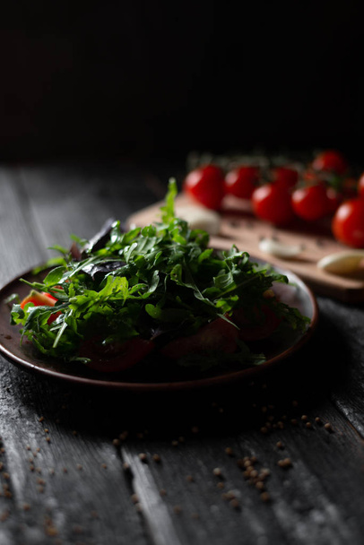 tasty diet food. fresh salad with arugula basil tomatoes feta cheese croutons - Photo, Image
