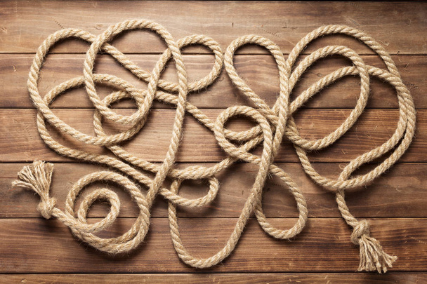 ship rope at wooden background texture - Foto, imagen