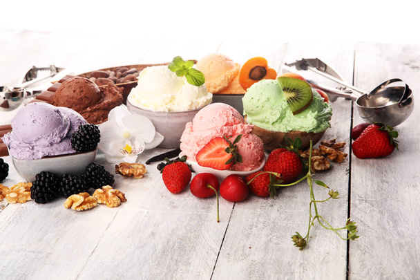 ice cream scoops of different colors and flavours with berries,  - Photo, Image