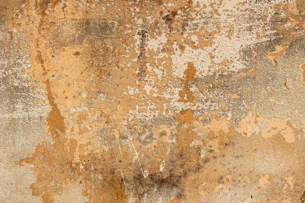 текстура бетонной стены с трещинами и царапинами, которые могут быть использованы в качестве фона - Фото, изображение