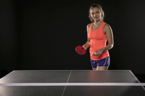 young beautiful athletic girl playing ping pong - Zdjęcie, obraz
