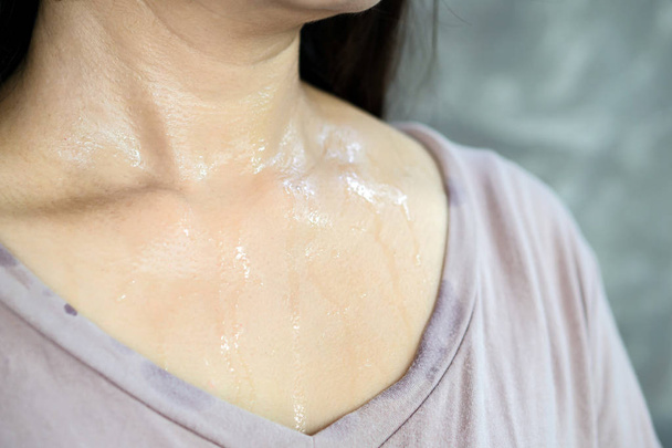 woman neck sweat skin closeup  - 写真・画像