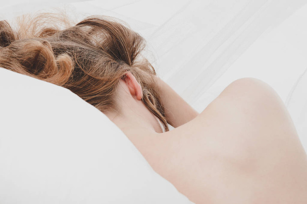 Dreaming blond woman in bed - Fotoğraf, Görsel
