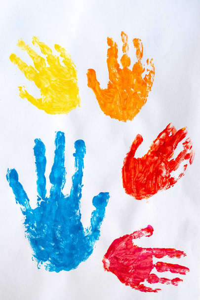 Watercolor colorful hand print on white background - 写真・画像