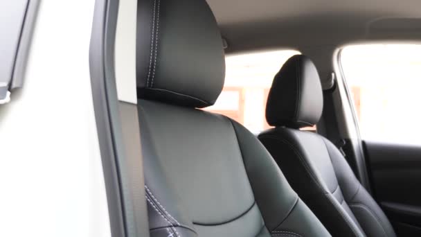 Black leather seat covers in the car. - Footage, Video