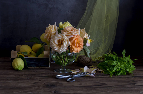 Still Life with roses and lemons - Photo, Image