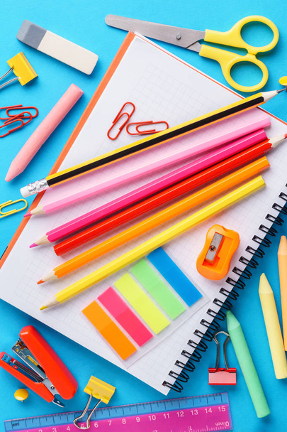 Set of various colorful school stationery on blue background. - Foto, immagini