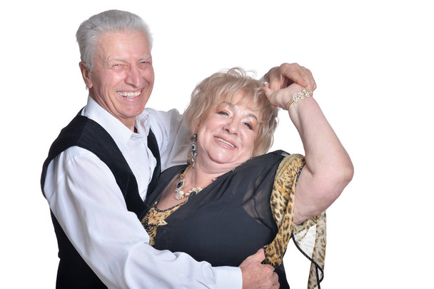 Portrait of happy  senior couple   dancing on  white background - Fotó, kép