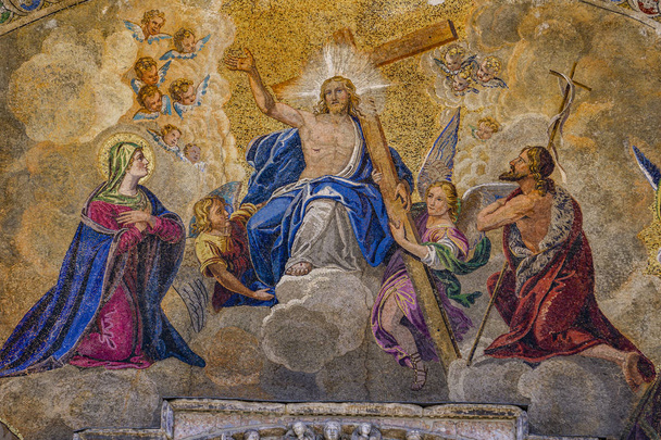Detail from lavishly decorated main port of St Mark 's Basilica, Venice Italy
 - Фото, изображение