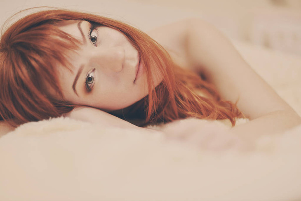 redhead young woman  in bed   - Fotografie, Obrázek